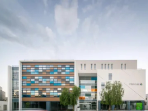 Modern healthcare facility building with contemporary architecture and colorful exterior design